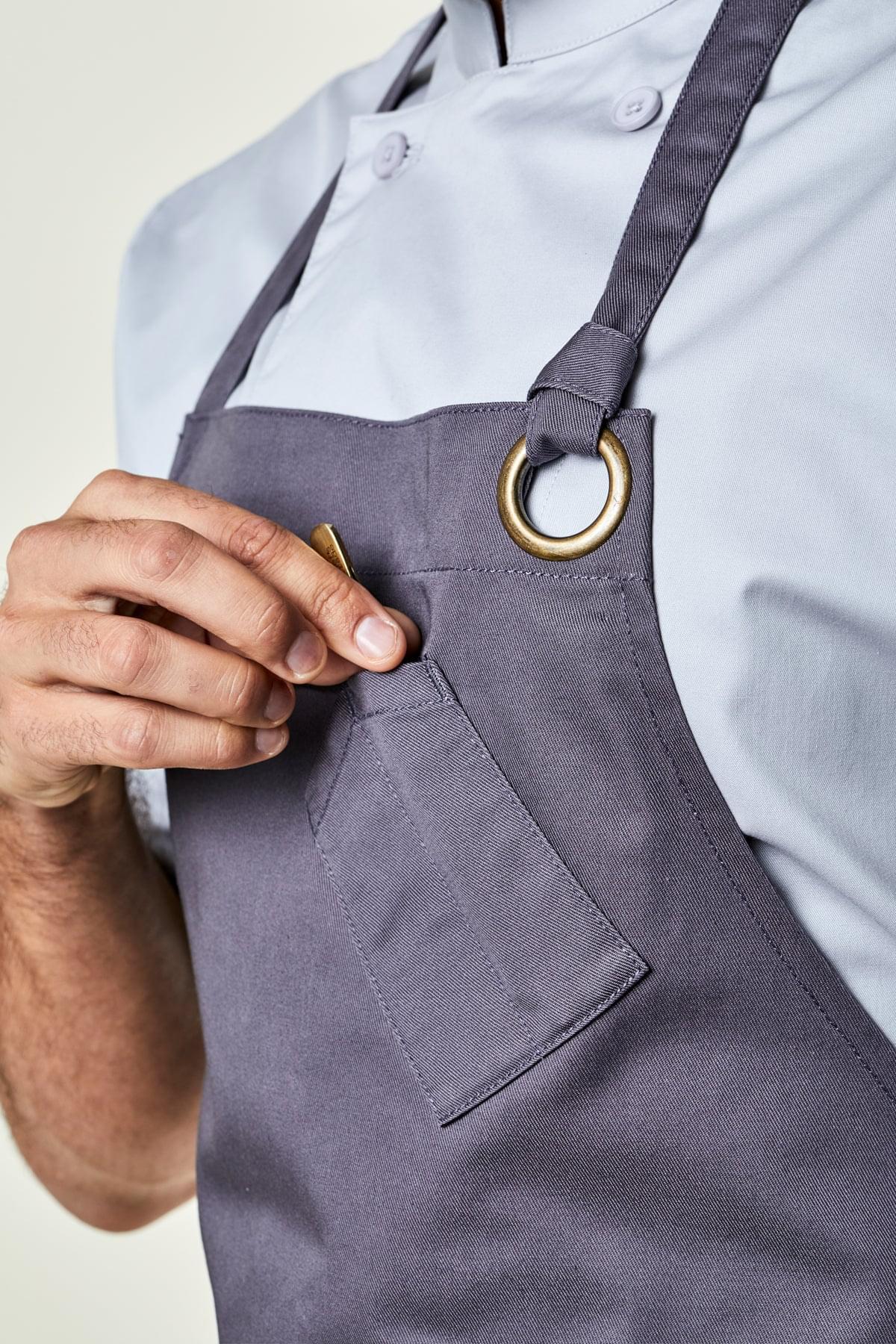 Close up image of person wearing Belfast Apron in Grey Twill. | BlueCut Aprons				