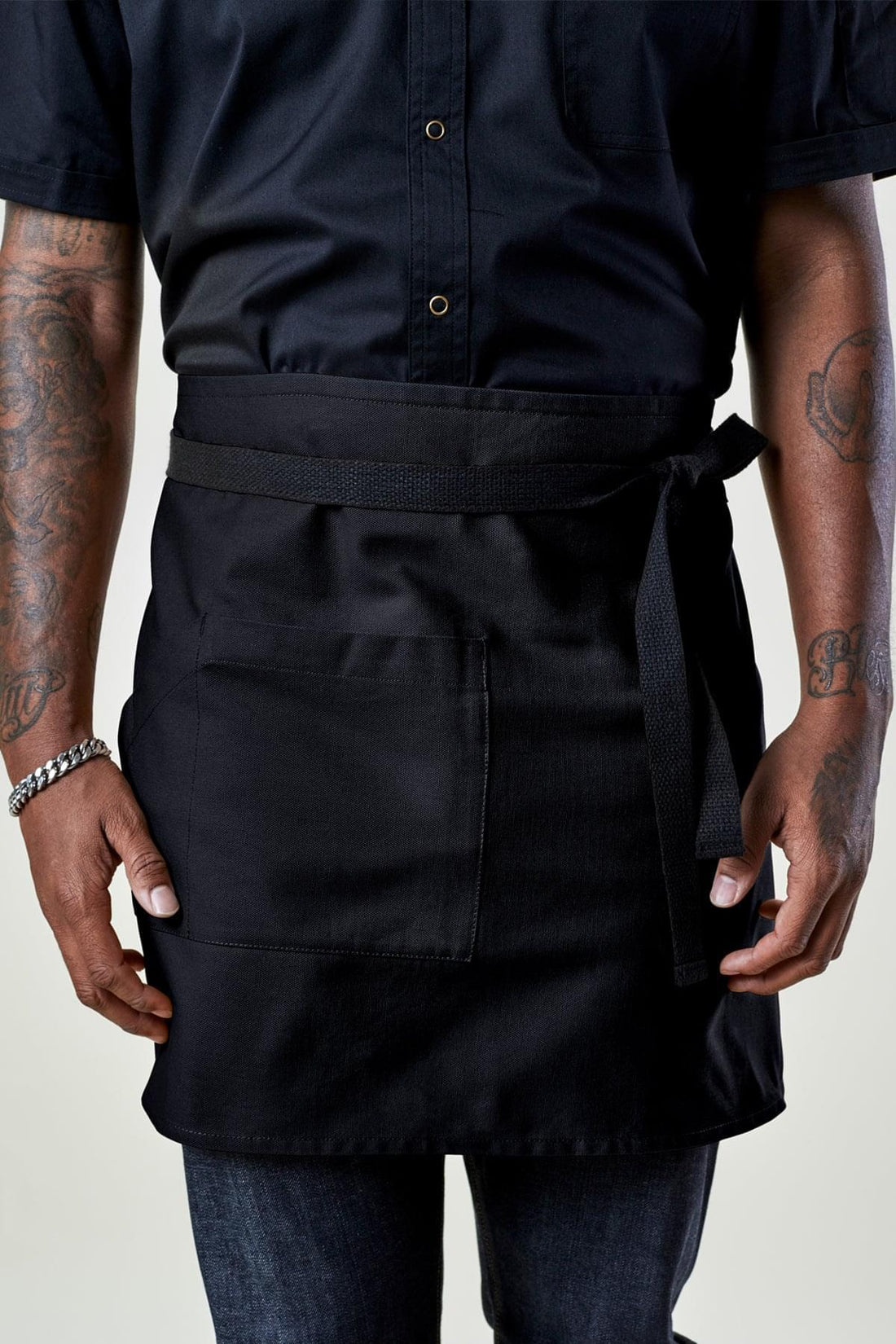 Image of person wearing Briston Waist Apron in Black Canvas. | BlueCut Aprons				