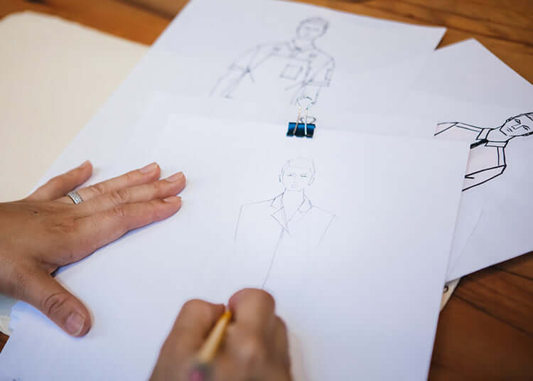 Image of person customizing chef clothes to specifications. | BlueCut Aprons