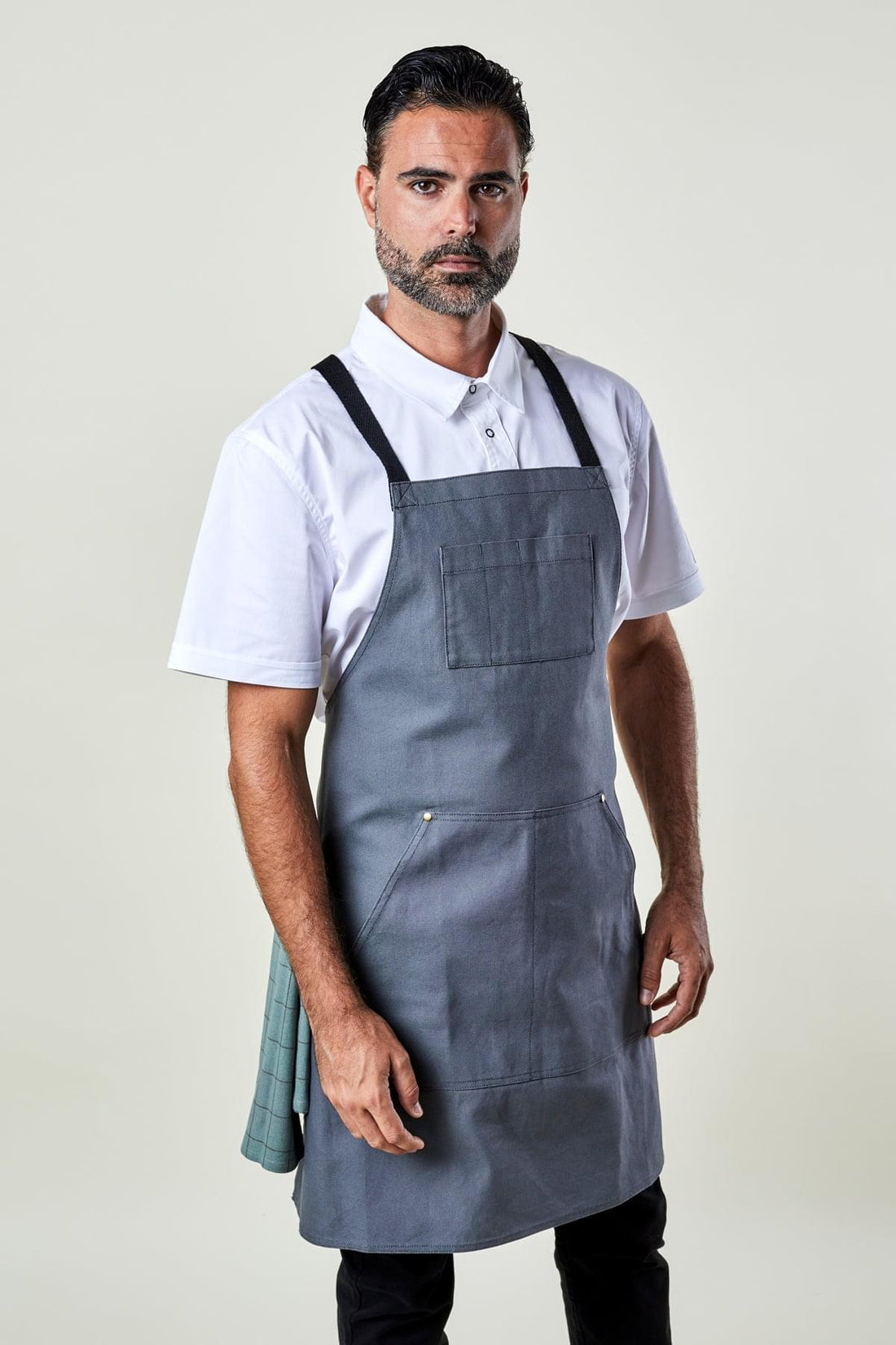 Image of person wearing Dover Cross Back Apron in Canvas. | BlueCut Aprons