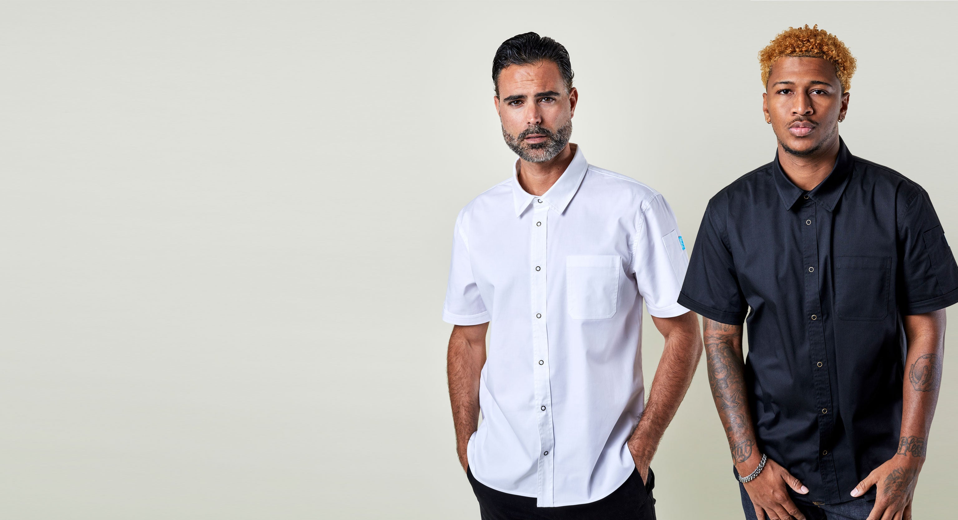 Image of people wearing Logan shirt in white and black. | BlueCut Aprons