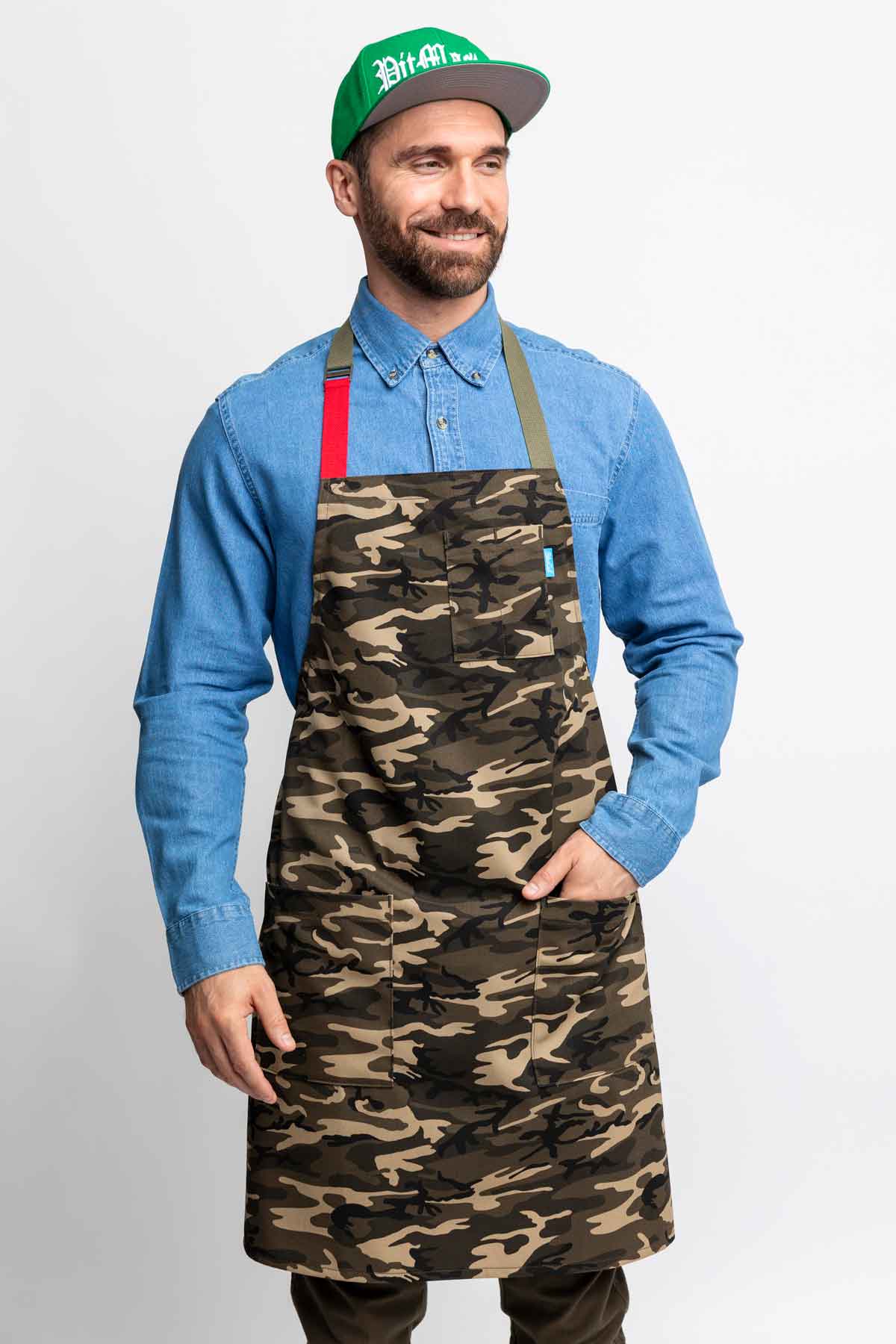 Front view of a man wearing a camo apron.