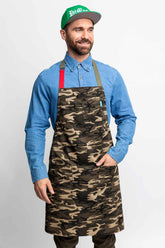 Front view of a man wearing a camo apron.