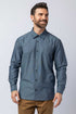 Men wearing blue long-sleeve chambray button-down shirts.