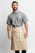 Man wearing a gray shirt and beige bistro apron on a white background