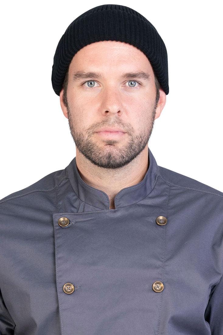 Front view a man wearing a black beanie.