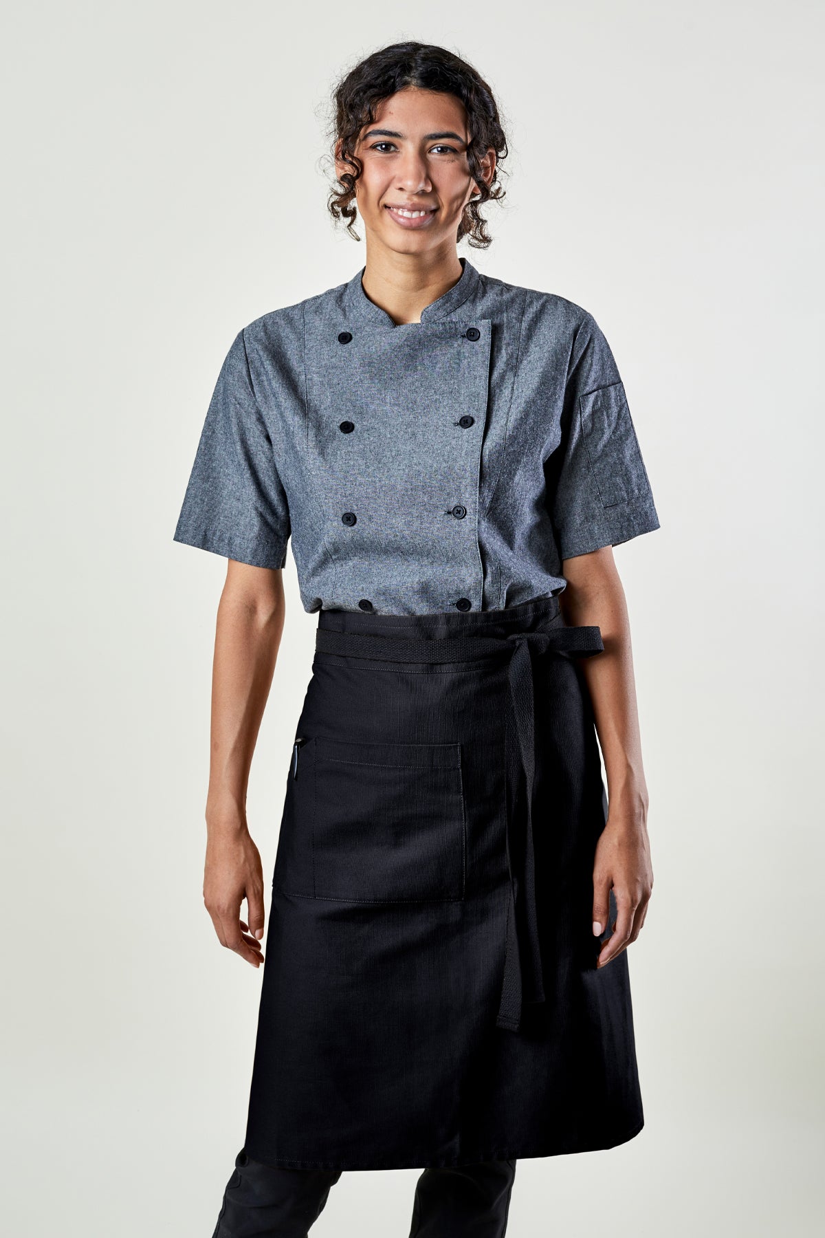 Image of person wearing Franklin Bistro Apron in Black Canvas. | BlueCut Aprons