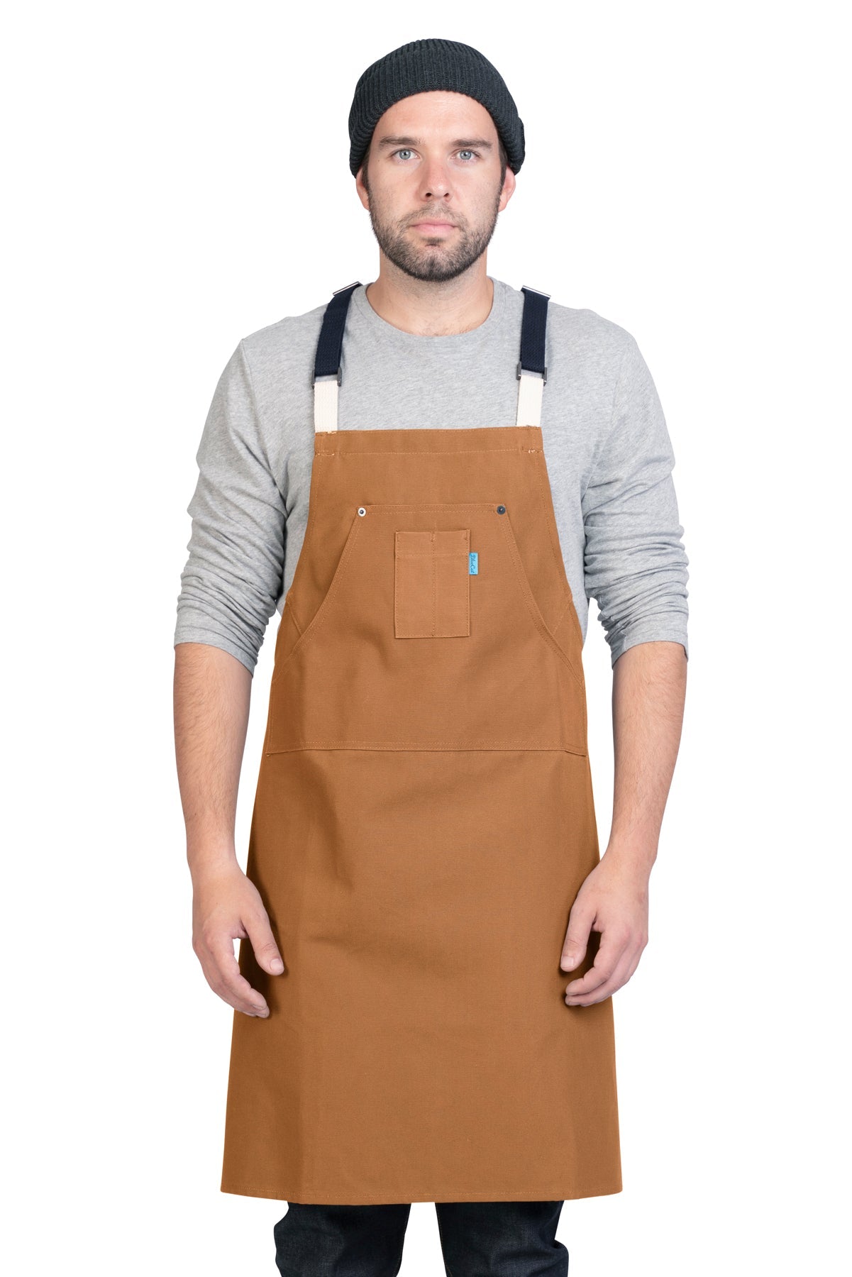 Image of person wearing Hatfield Crossback Apron in Whiskey Canvas. | BlueCut Aprons