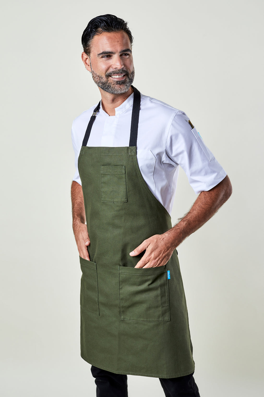 Image of person wearing Mise Canvas apron in olive. | BlueCut Aprons	