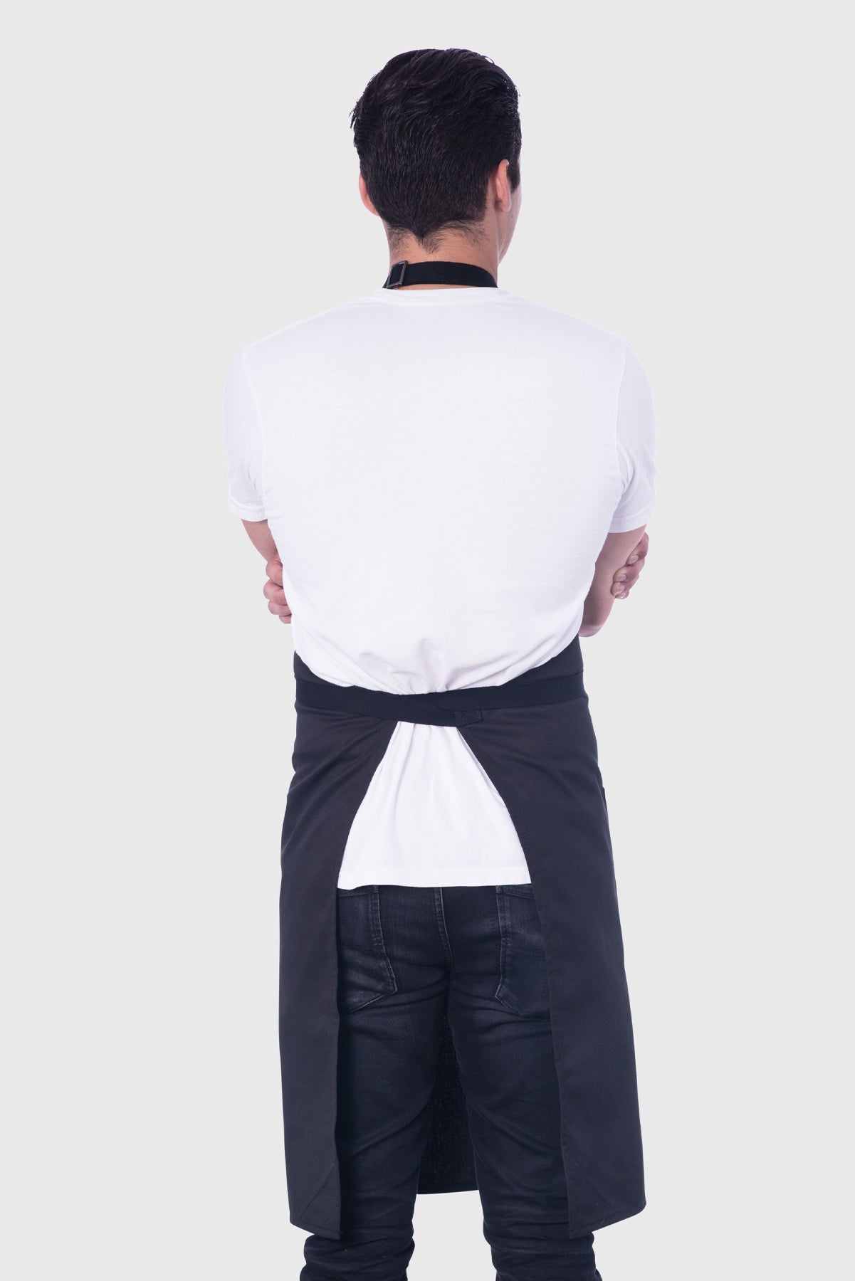 Back view image of person wearing Line Apron in Black Poly Cotton Twill. | BlueCut Aprons