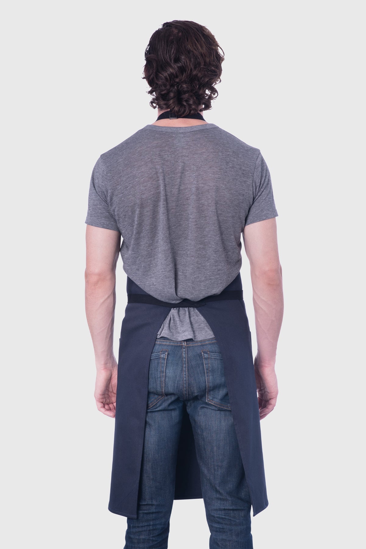 Back view image of person wearing Line Apron in Navy Poly Cotton Twill. | BlueCut Aprons