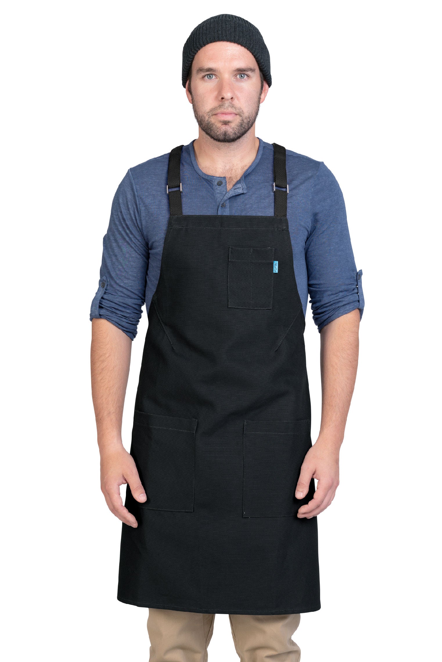 Image of person wearing Lucca Crossback Apron in Black Canvas. | BlueCut Aprons