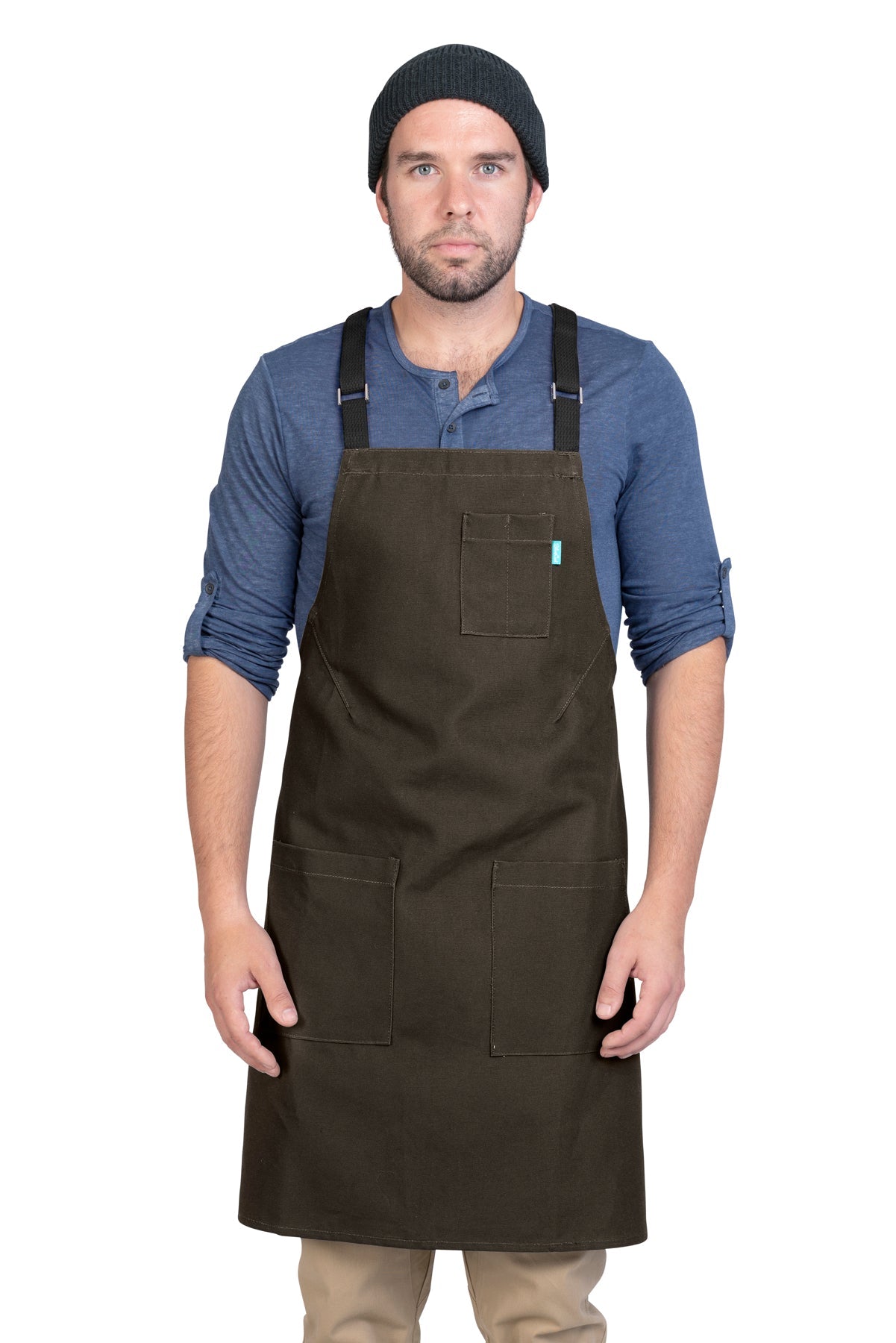 Image of person wearing Lucca Crossback Apron in Dark Brown Canvas. | BlueCut Aprons