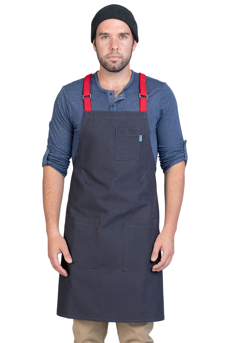 Image of person wearing Lucca Crossback Apron in Canvas. | BlueCut Aprons				