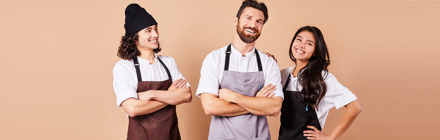 Image of people wearing chef aprons in brown, grey and black. | BlueCut Aprons