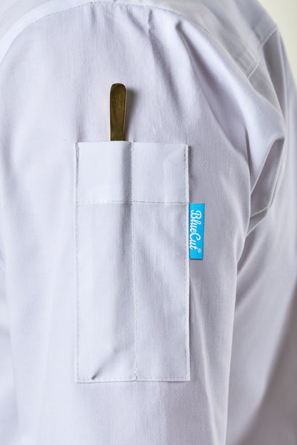 White chef coat with a  pen pocket and a BlueCut label on a light background