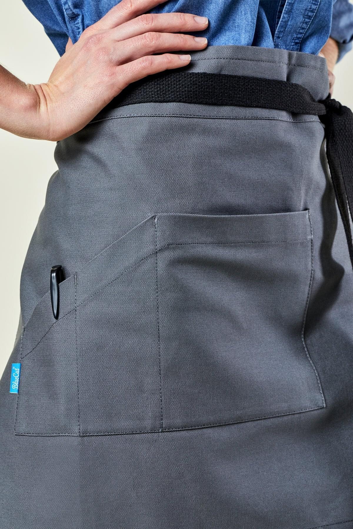 Close up image of person wearing Briston Waist Apron in Grey Canvas. | BlueCut Aprons				
