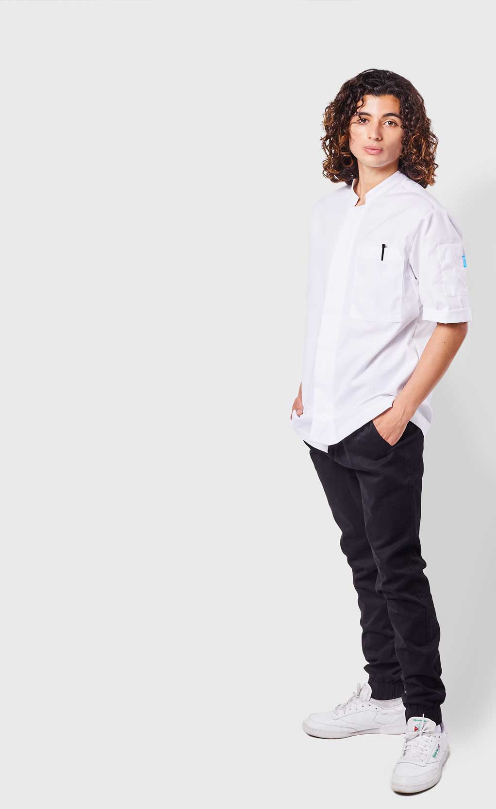 Image of person wearing Greyson Chef Coat and Brooklyn Jogger. | BlueCut Aprons		