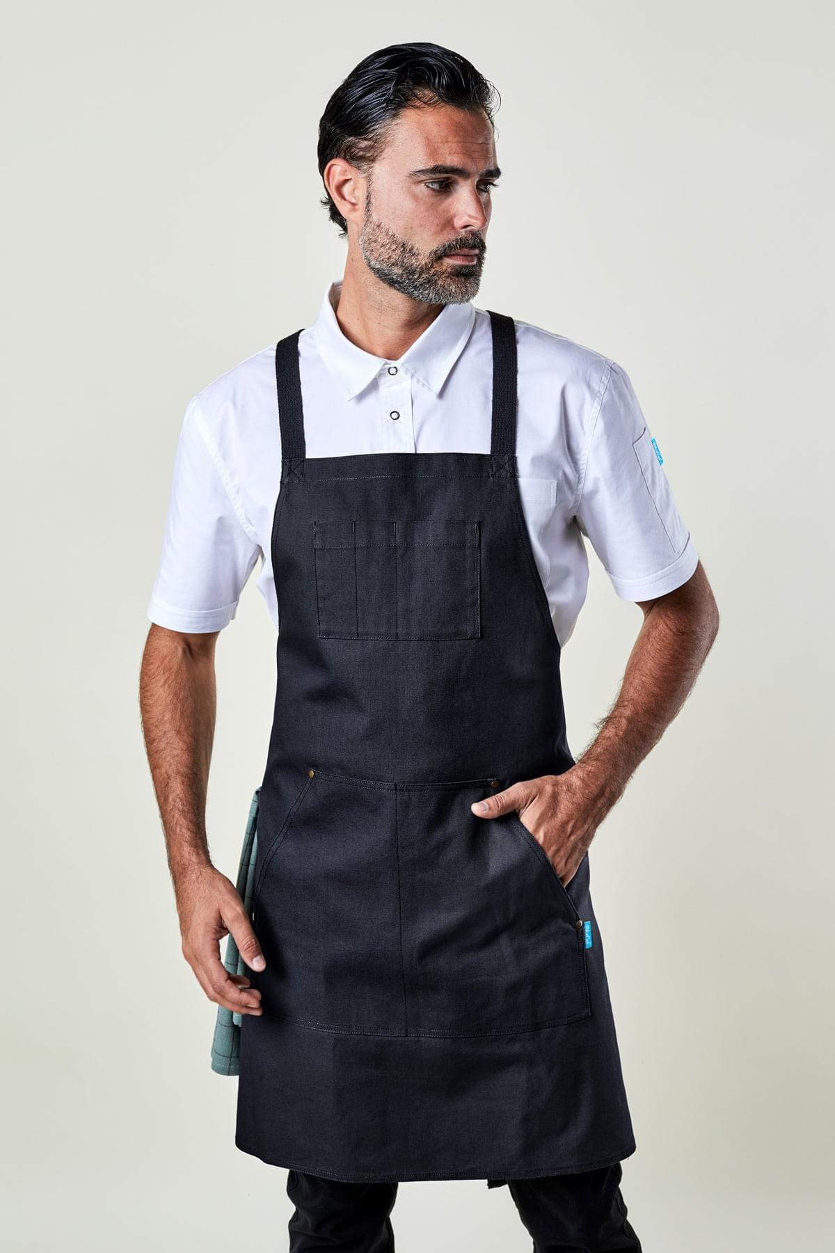 Image of person wearing Dover Cross Back Apron in Black Canvas. | BlueCut Aprons
