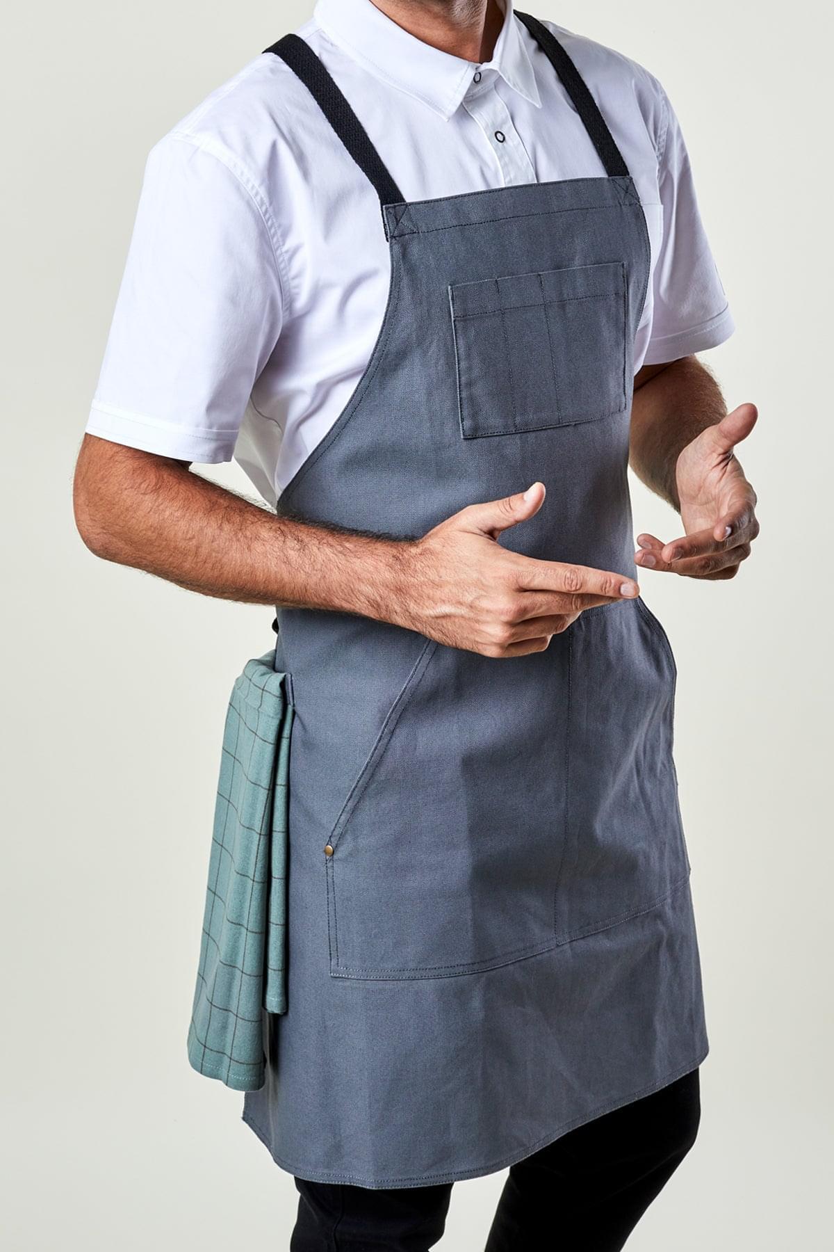Image of person wearing Dover Cross Back Apron in Grey Canvas. | BlueCut Aprons