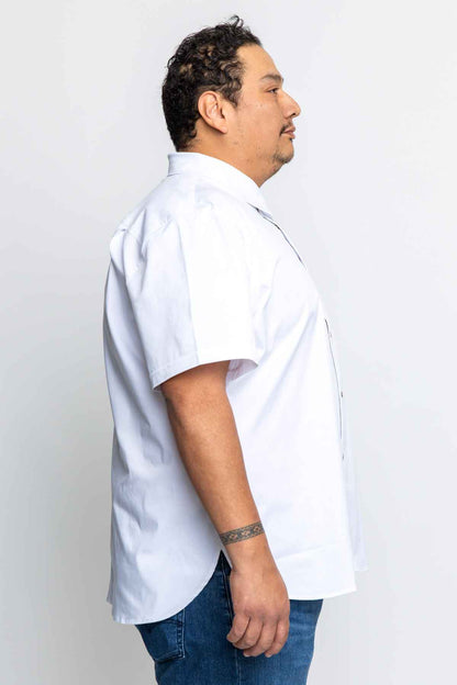 A profile of a plus size man wearing a white short-sleeved work shirt.-BlueCut Workwear