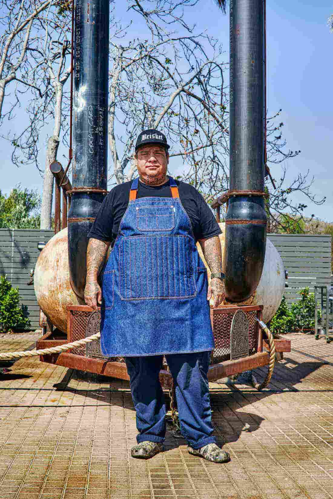 Image of a person wearing Pitmaster apron. | BlueCut Aprons