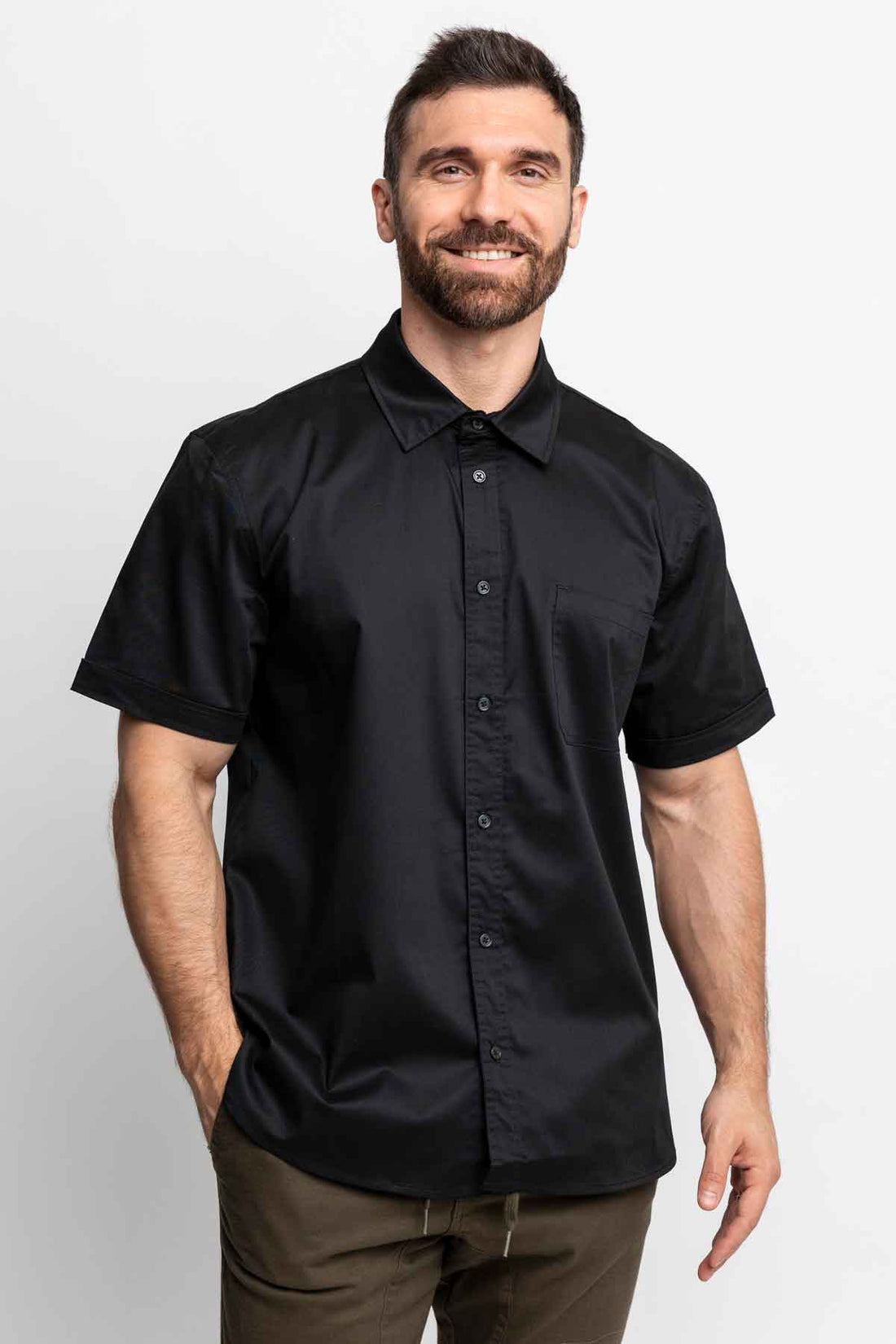Men wearing black short-sleeve button-down shirts.