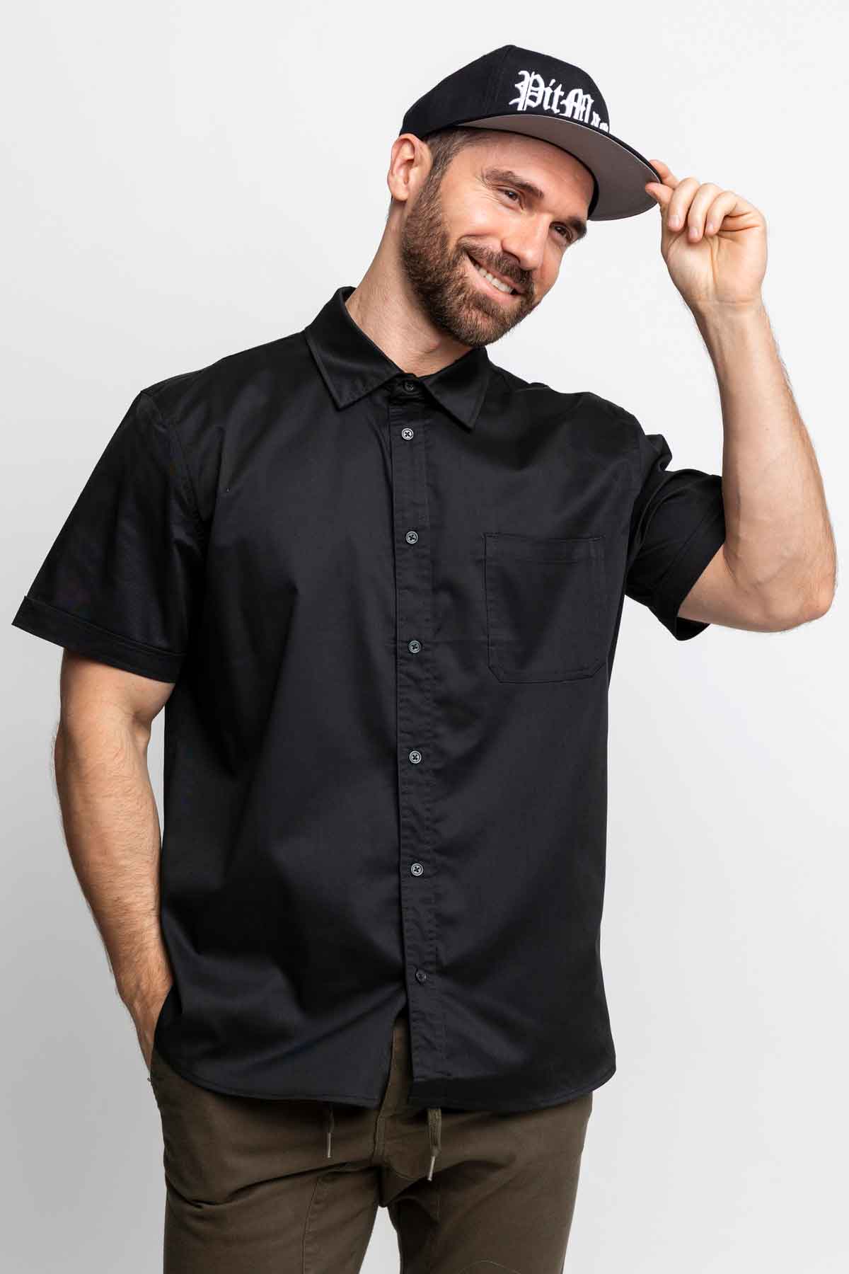 Men wearing black short-sleeve button-down shirts.