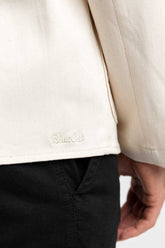 Close-up of the BlueCut logo on the task jacket.