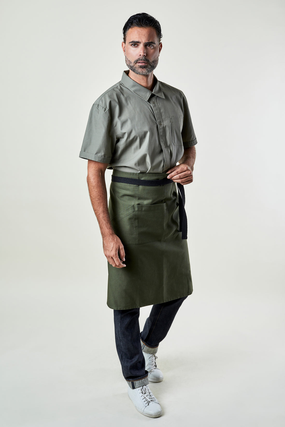 Image of person wearing Franklin Bistro Apron in Olive Canvas. | BlueCut Aprons				