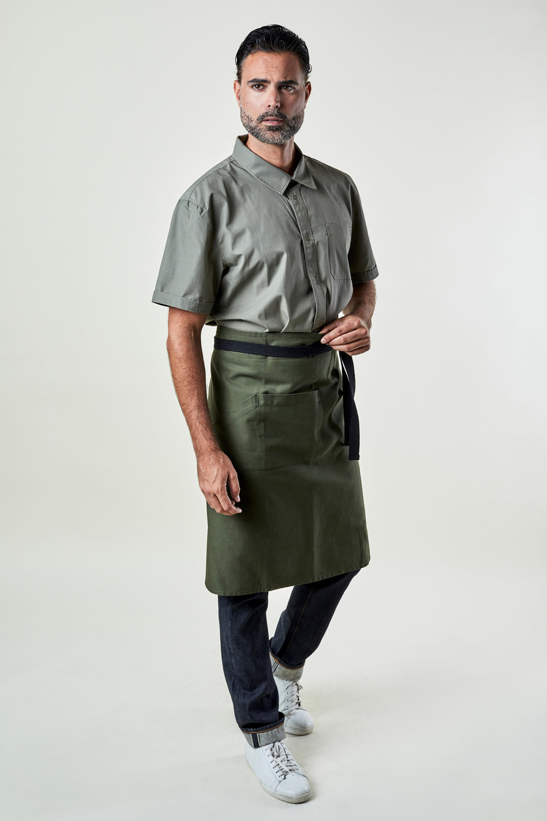 Image of person wearing Franklin Bistro Apron in Olive Canvas. | BlueCut Aprons