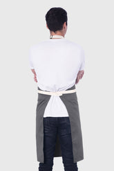 Back view image of person wearing Line Apron in Cotton Twill. | BlueCut Aprons