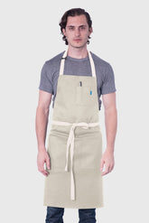 Image of person wearing Line Apron in Stone Cotton Twill. | BlueCut Aprons