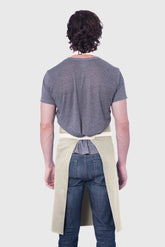 Back view image of person wearing Line Apron in Stone Cotton Twill. | BlueCut Aprons