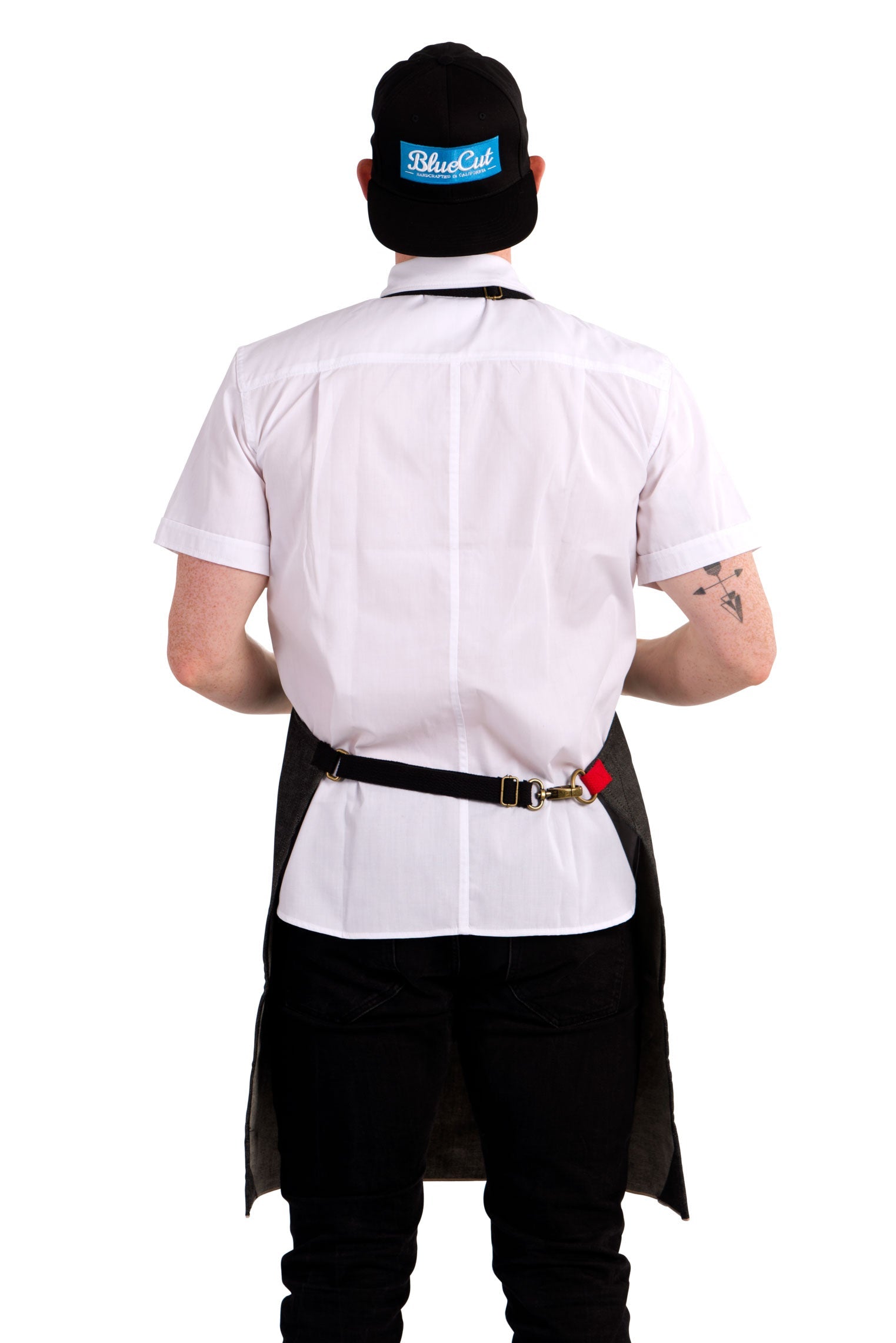 Back view image of person wearing Mason Apron in Black Selvage Denim. | BlueCut Aprons
